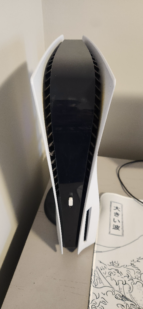 PS5 with 2 controllers and controller mods image indicator(3)