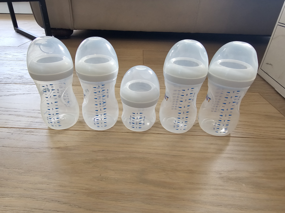 5 plastic baby bottles (no nipples) thumbnail