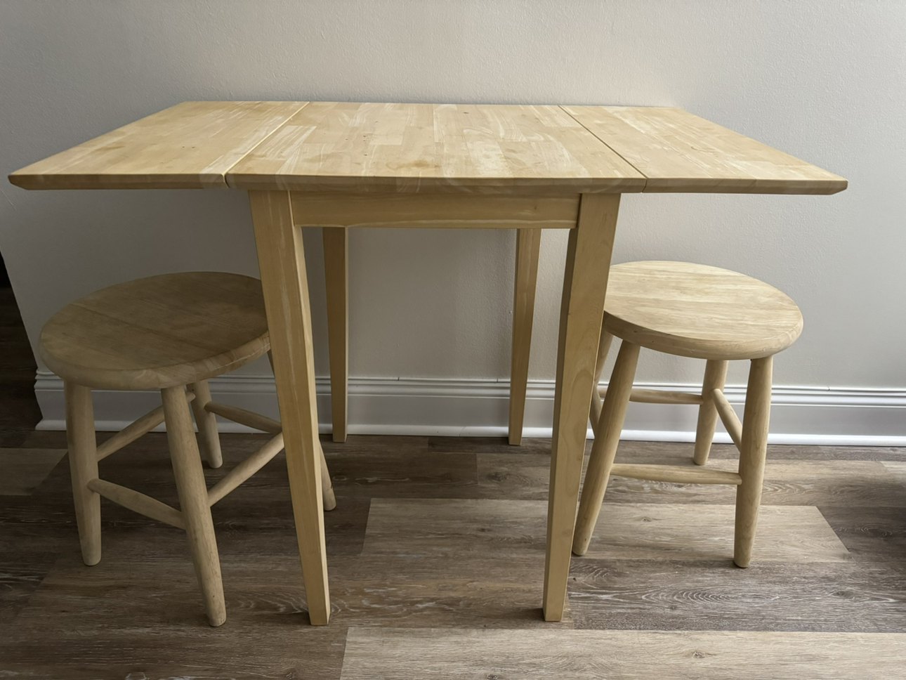 MOVE OUT SALE. Solid Wood Drop Leaf Table + Stools