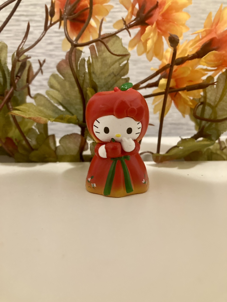 collectible apple hello kitty figure thumbnail