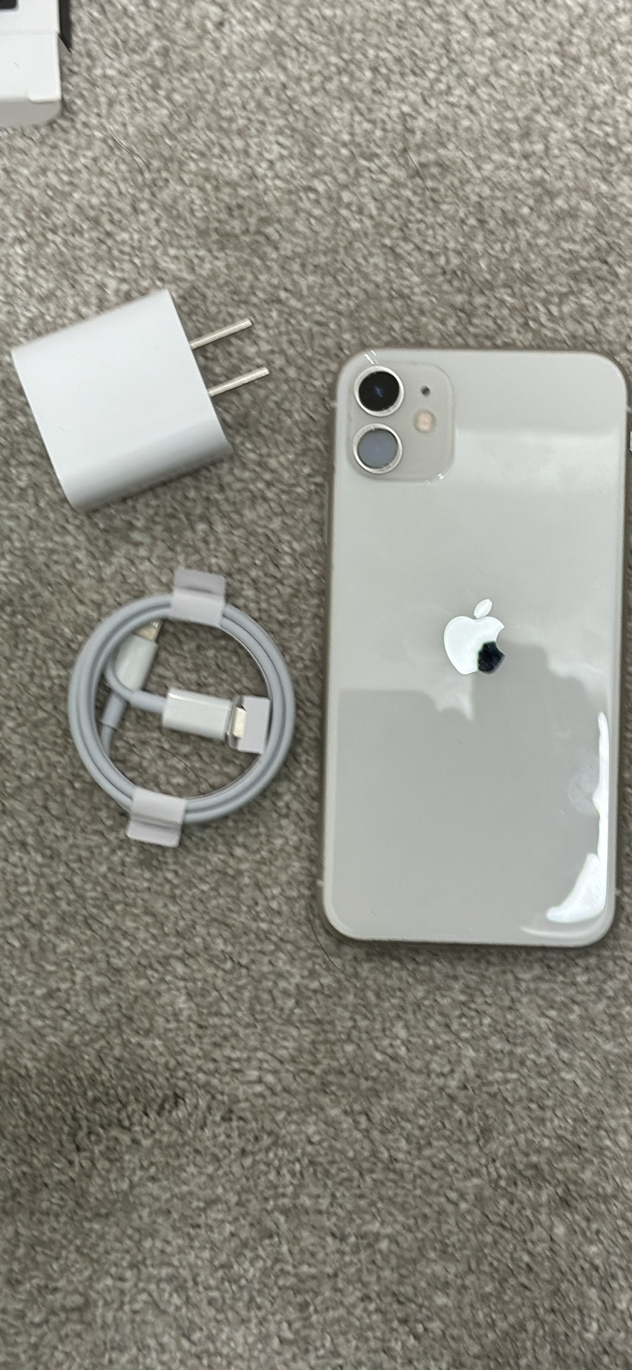 iPhone 11 with cable and charger thumbnail