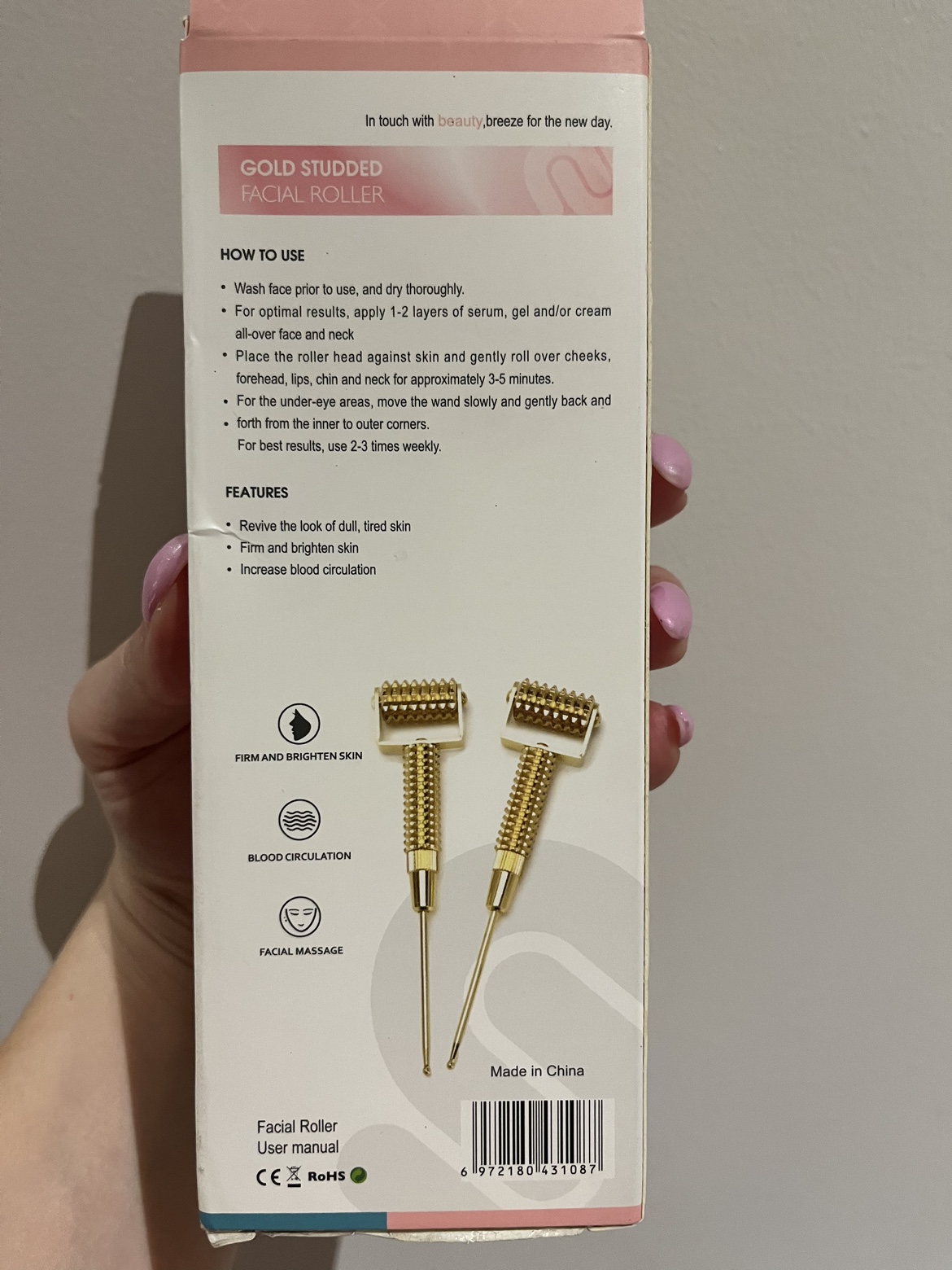 Gold studded facial roller image indicator(3)