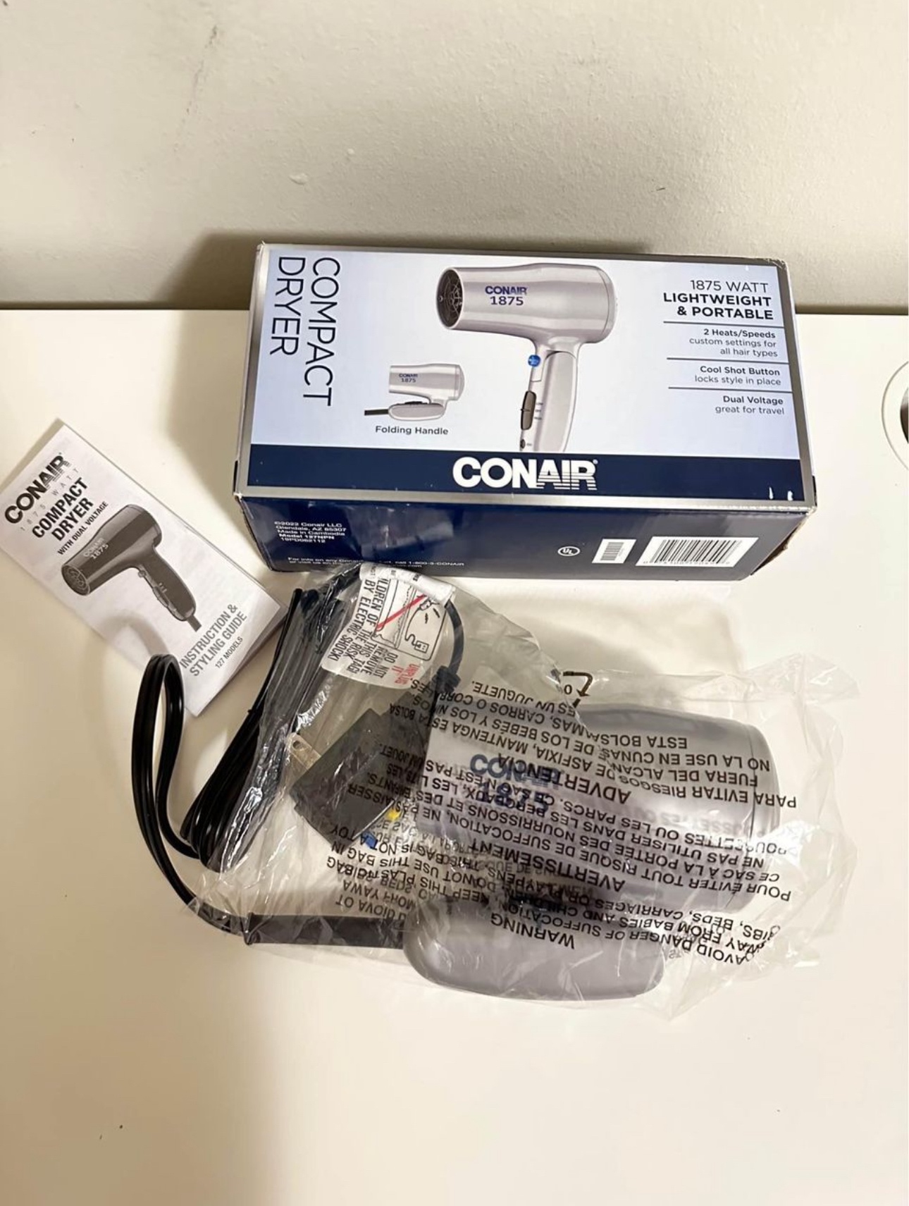 Compact Folding Hair Dryer Dual Voltage image indicator(2)