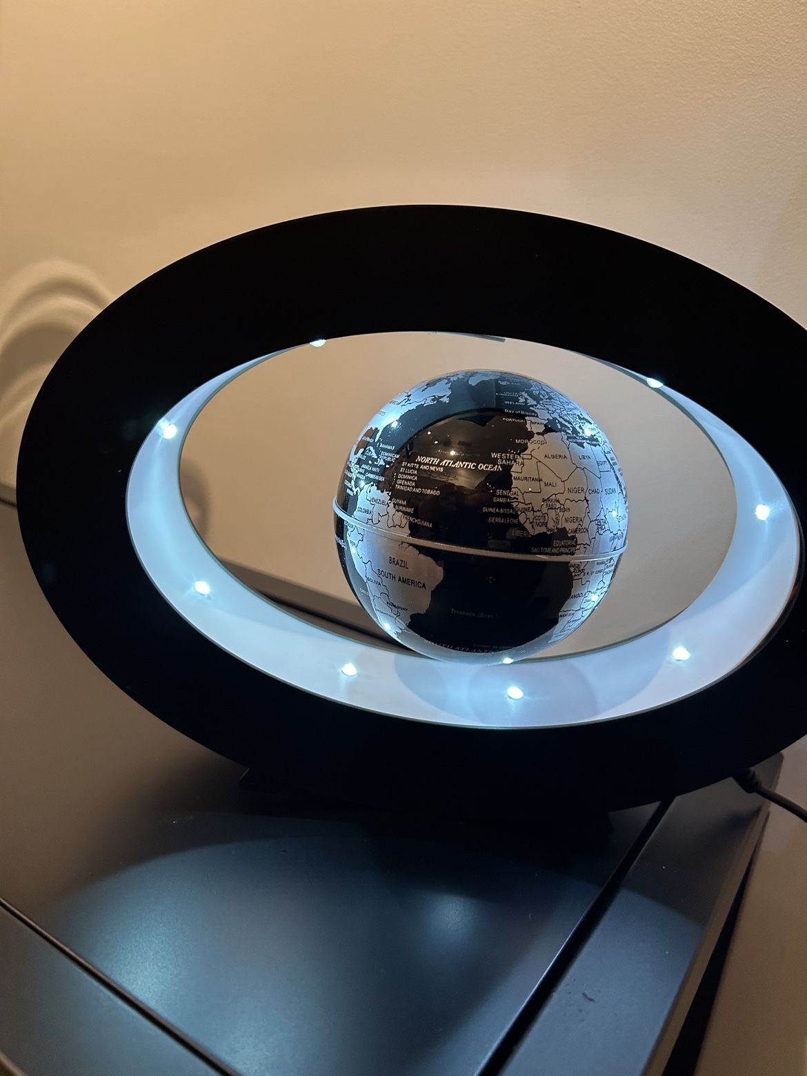 LED Suspended globe ( light is white)