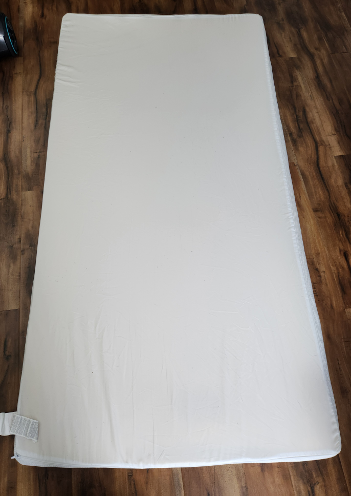 Foam mattress and cover. Twin