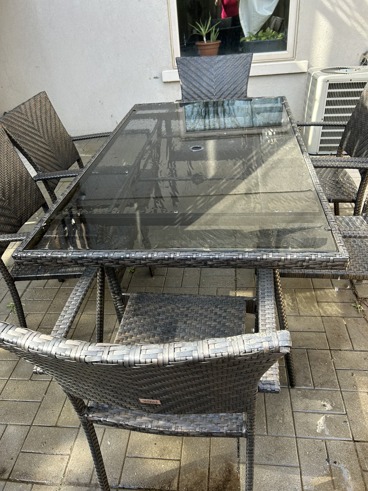 A Patio set table with glass top  with 6 chairs image indicator(5)