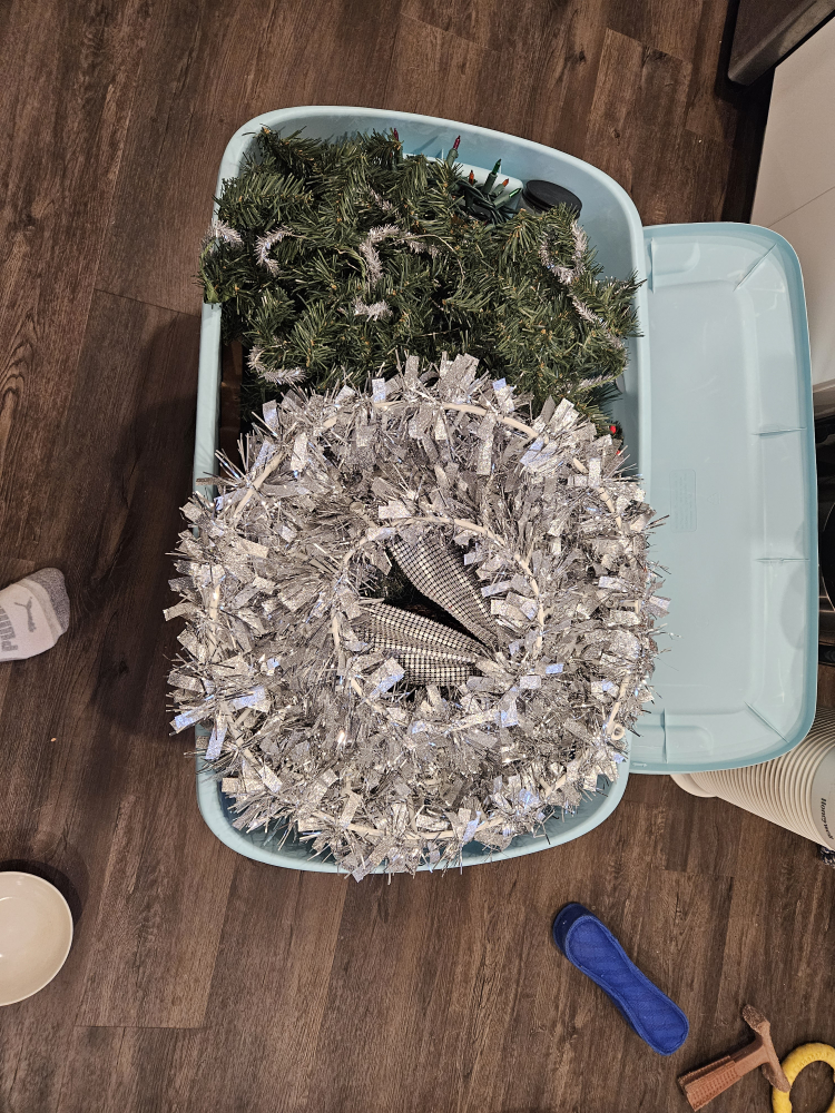 bin of Christmas decorations