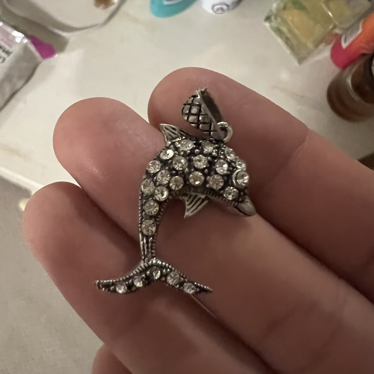 Sterling silver dolphin shape pendant