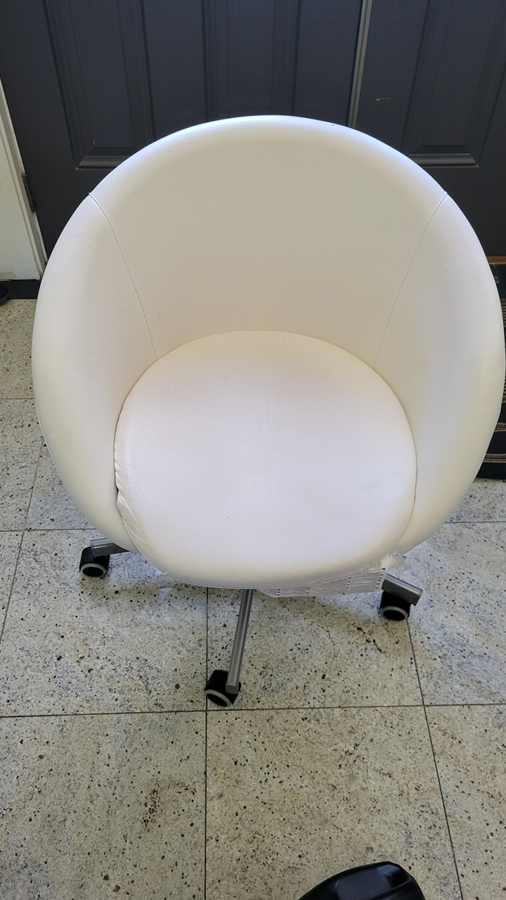 White upholstered swivel desk chair 