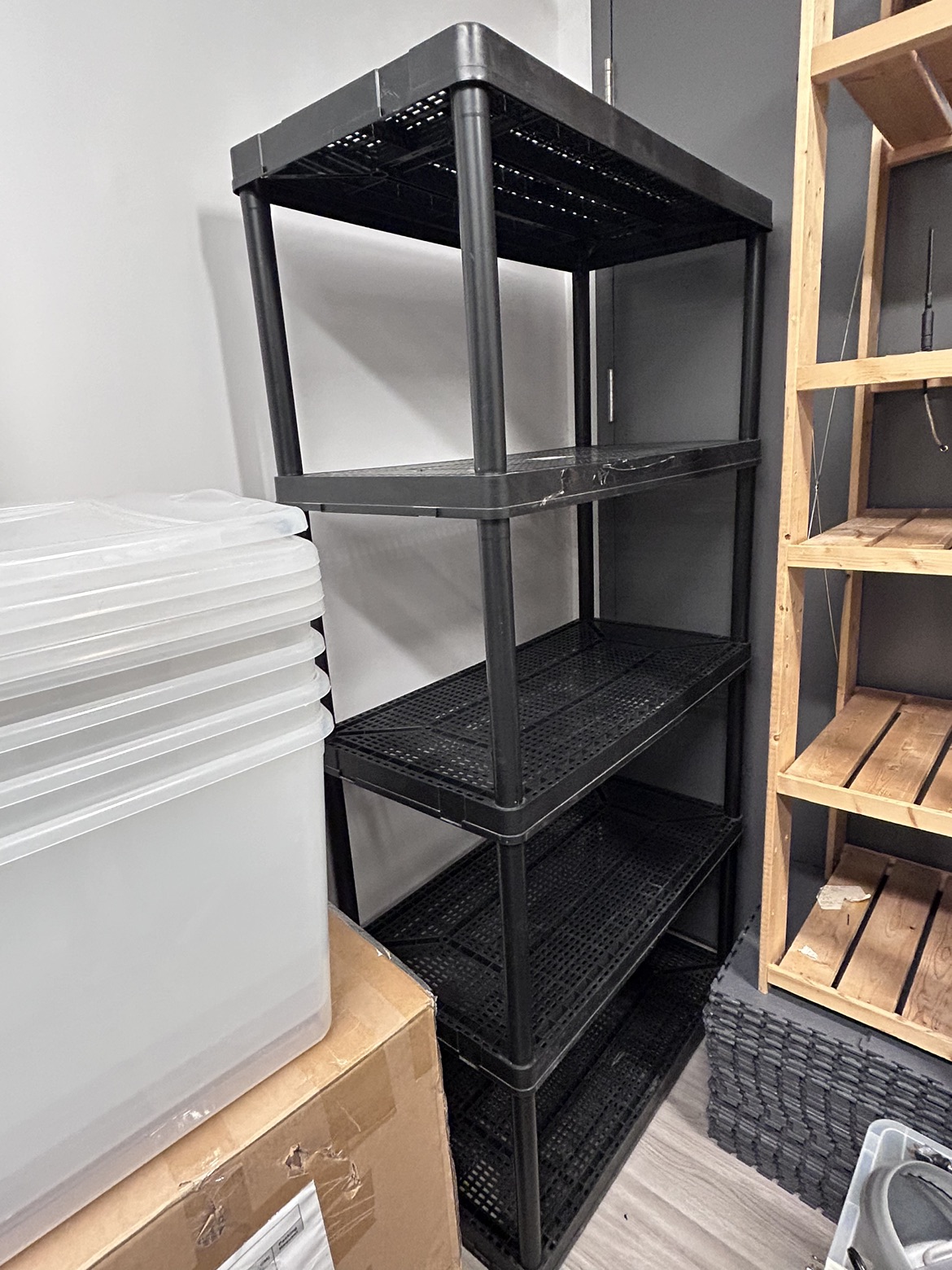 Sturdy black plastic shelving unit thumbnail