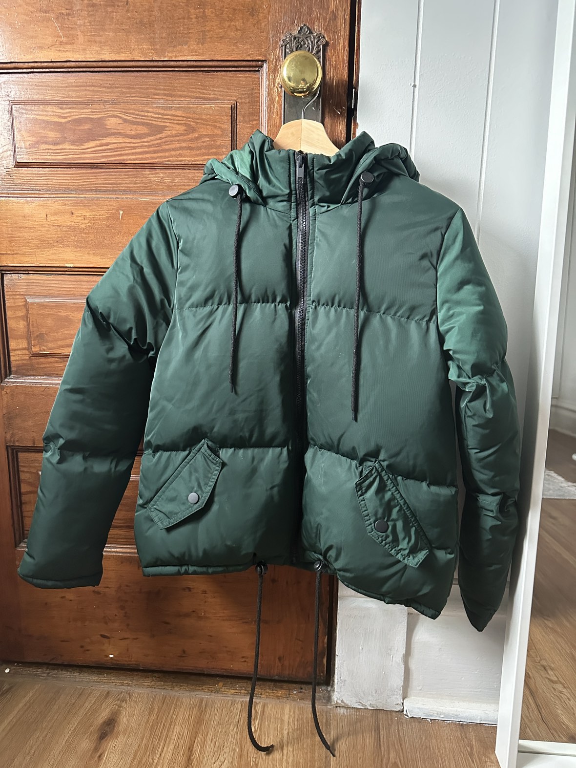 Green puffer coat
