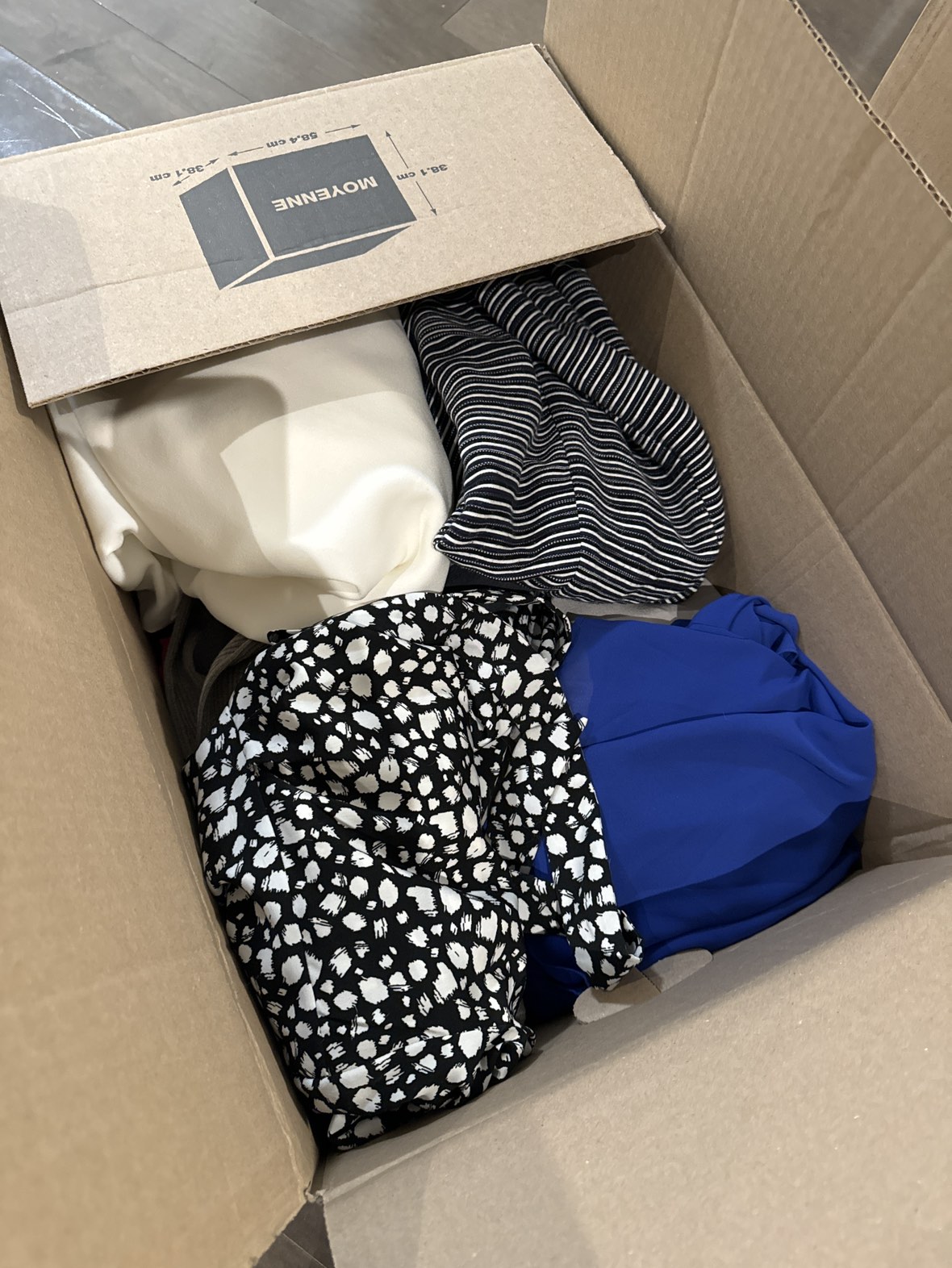 large box of women’s clothing