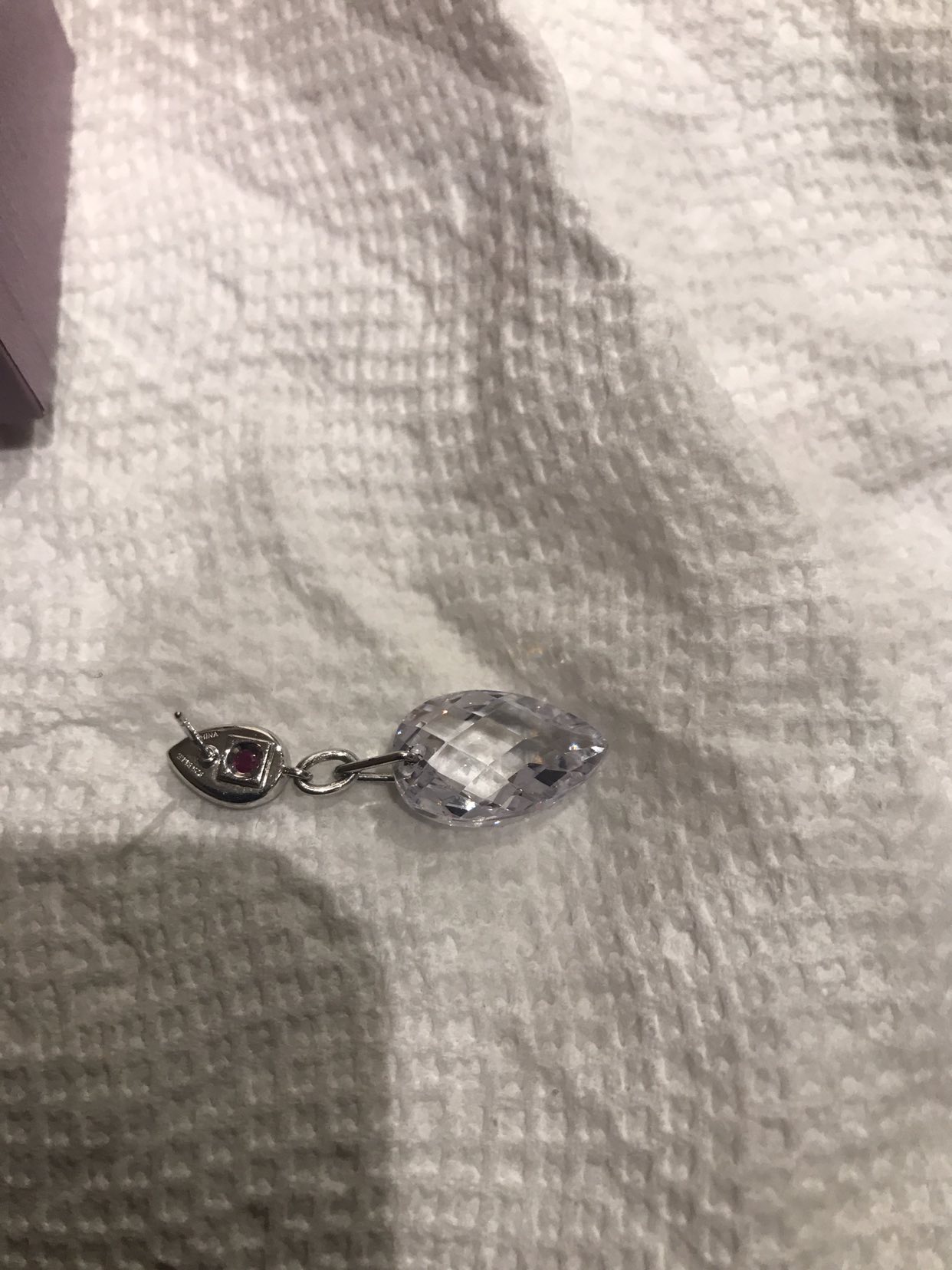 Upside down tear drop crystal with hidden ruby in the back image indicator(2)