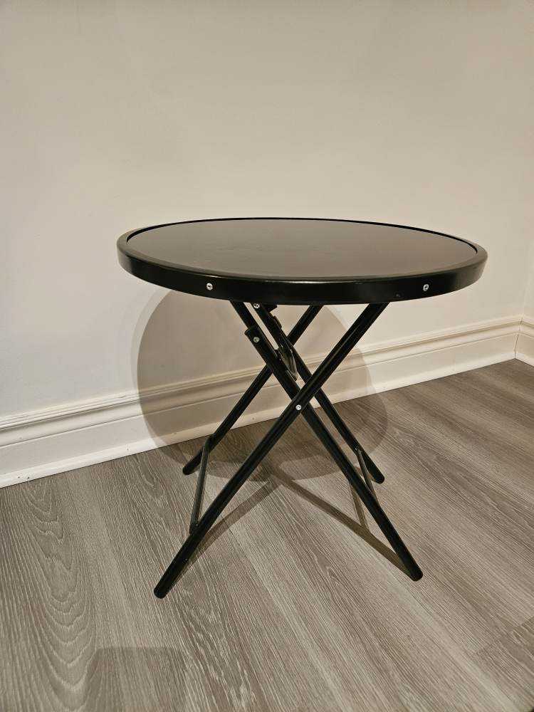 small black bistro style table