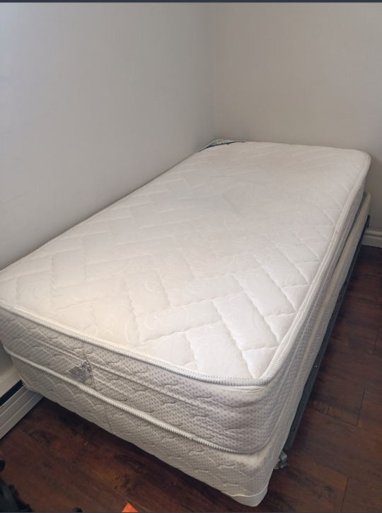White twin mattress with box and metal frame