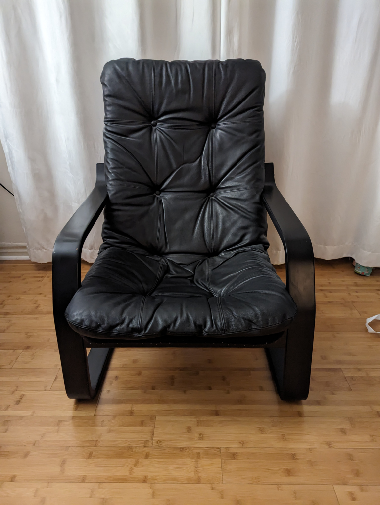 GENUINE black leather chair