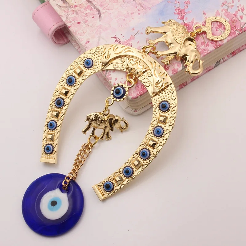 Elephant evil eye pendant