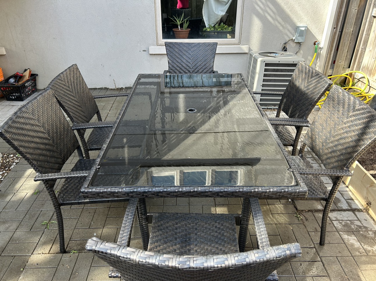 A Patio set table with glass top  with 6 chairs image indicator(3)