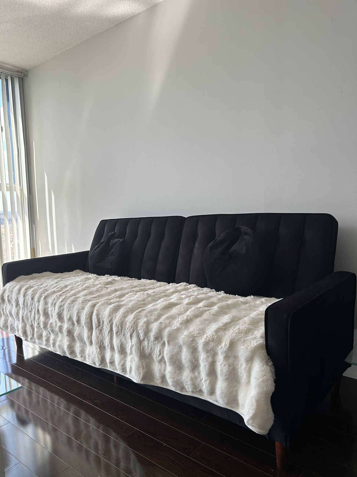 Black Sofa cum bed  2 Cushions Velvet soft luxurious white throw