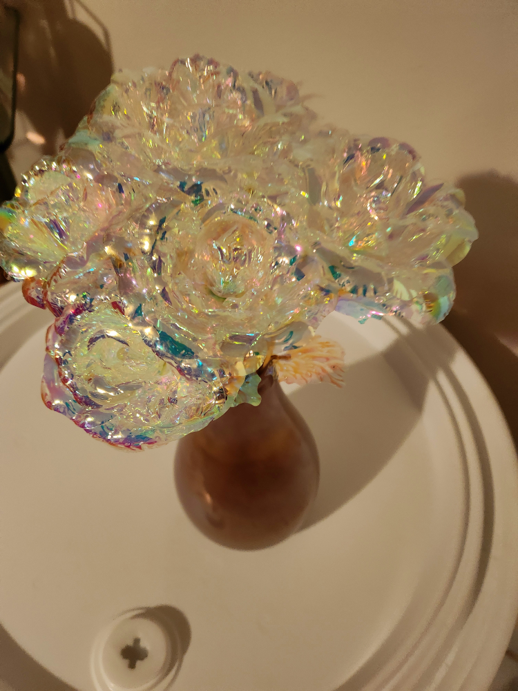 Pink vase with flowers image indicator(2)