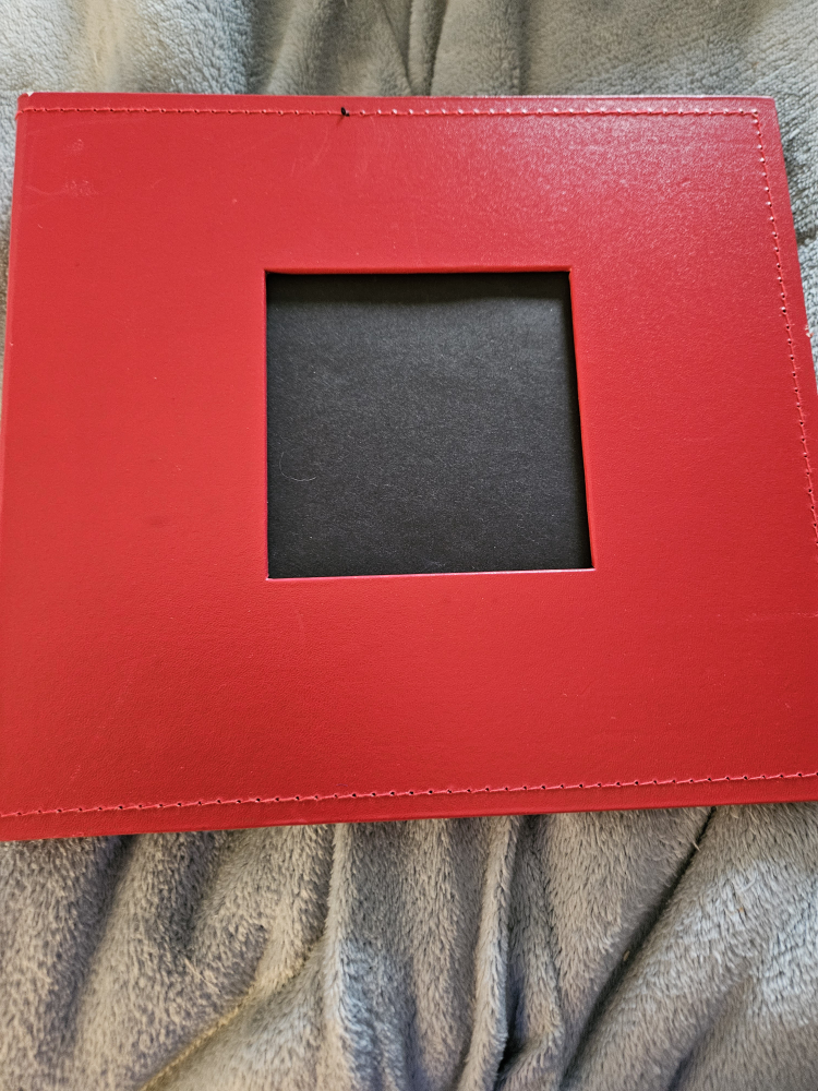 New red leather photo album