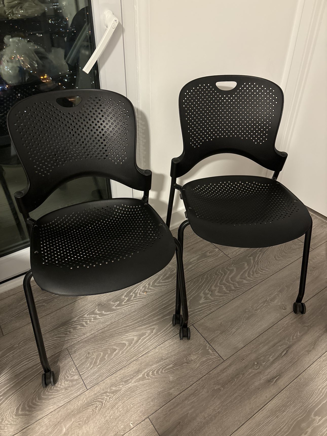 A pair of Rolling Chairs