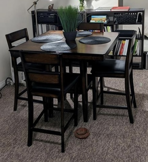 Pub height solid dining table and 4 chairs