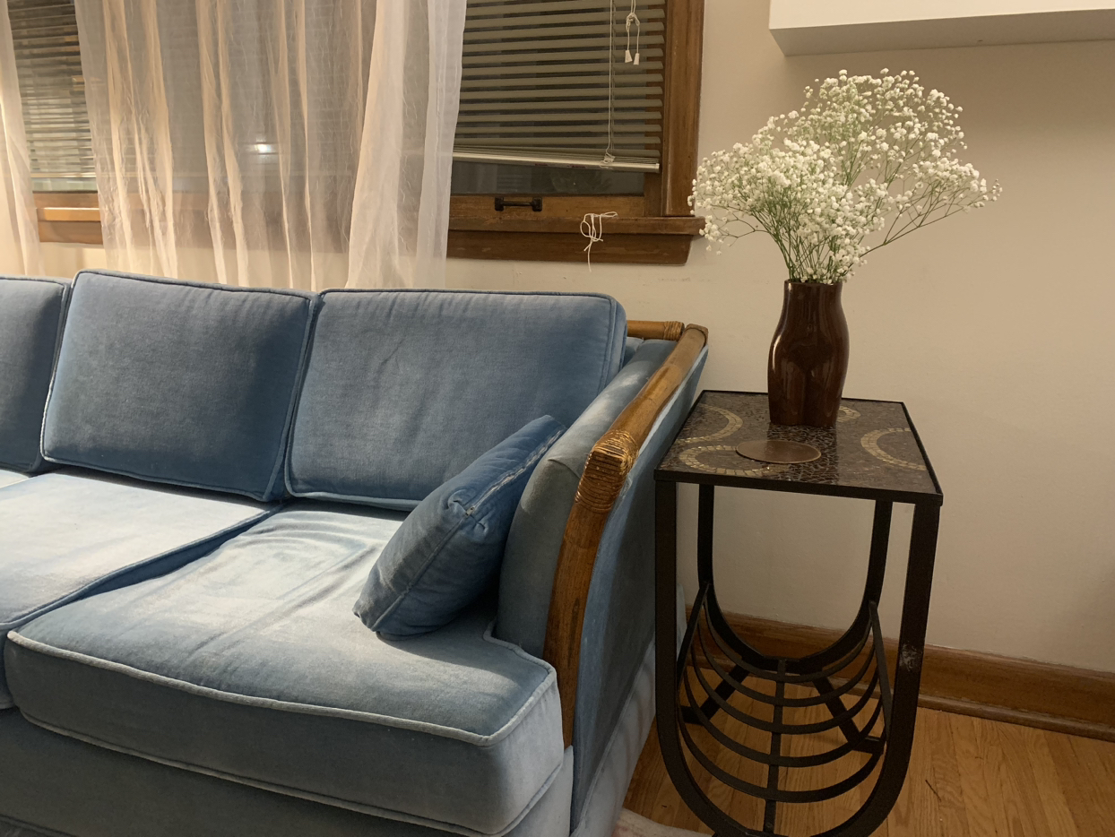 Vintage MCM blue velvet pullout couch with teal accents