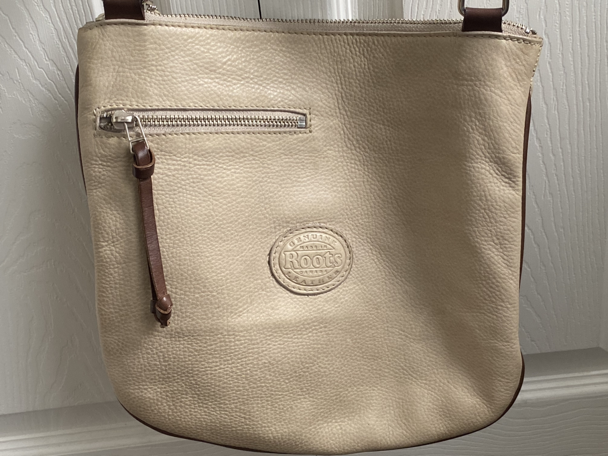 Roots cross body. image indicator(5)