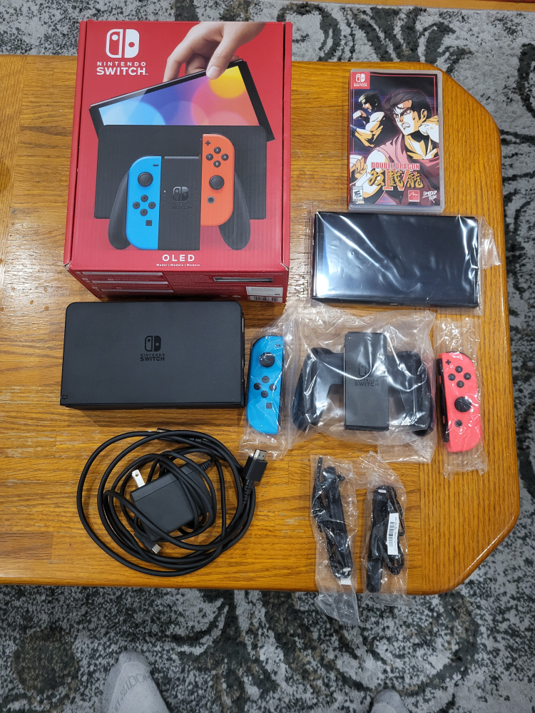 Nintendo Switch OLED barely used!!! with game