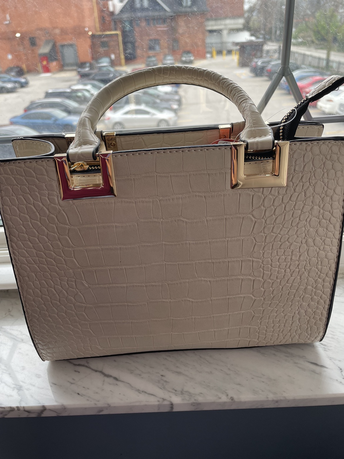 Brand new.. Handbag with strap..