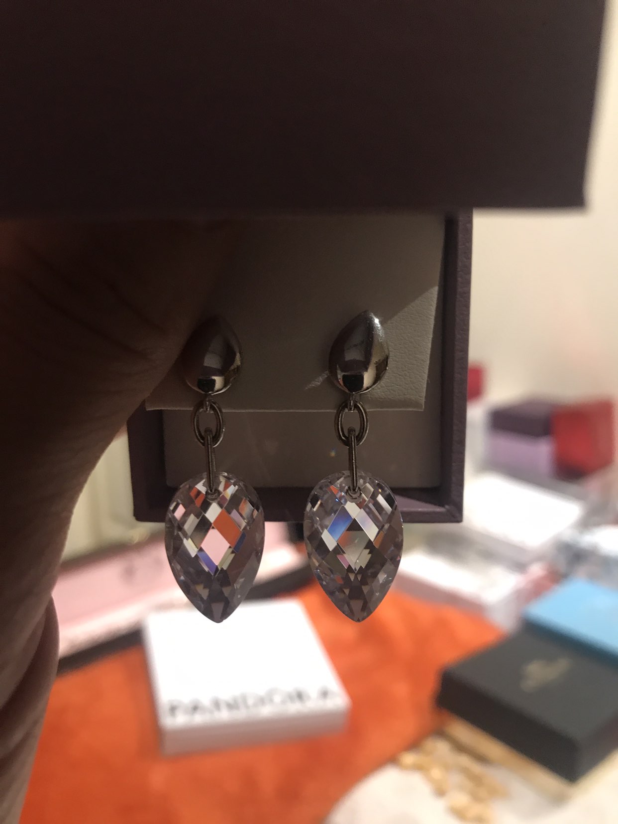 Upside down tear drop crystal with hidden ruby in the back image indicator(3)