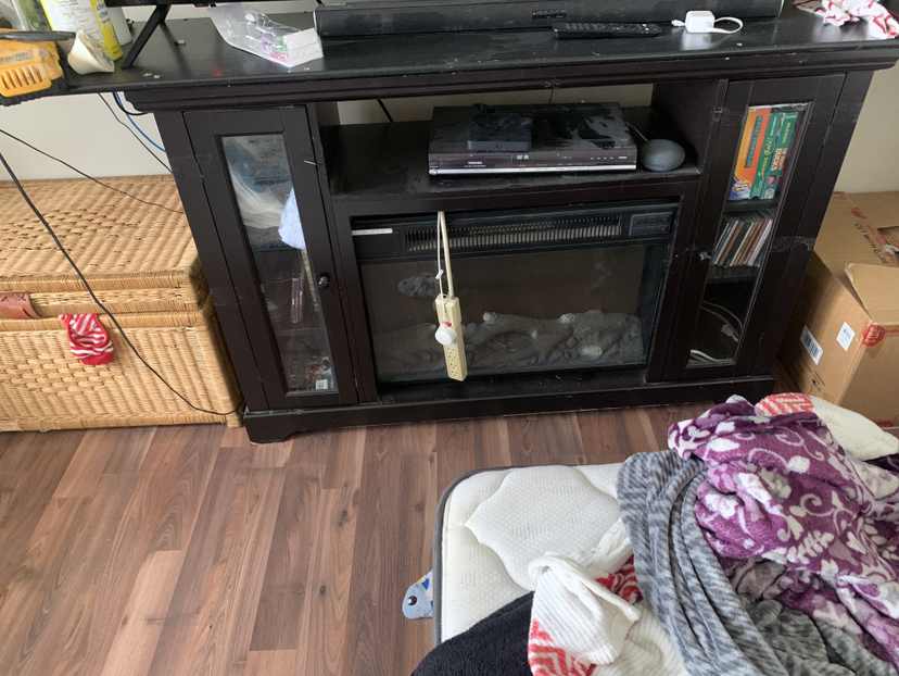 Entertainment unit with fireplace
