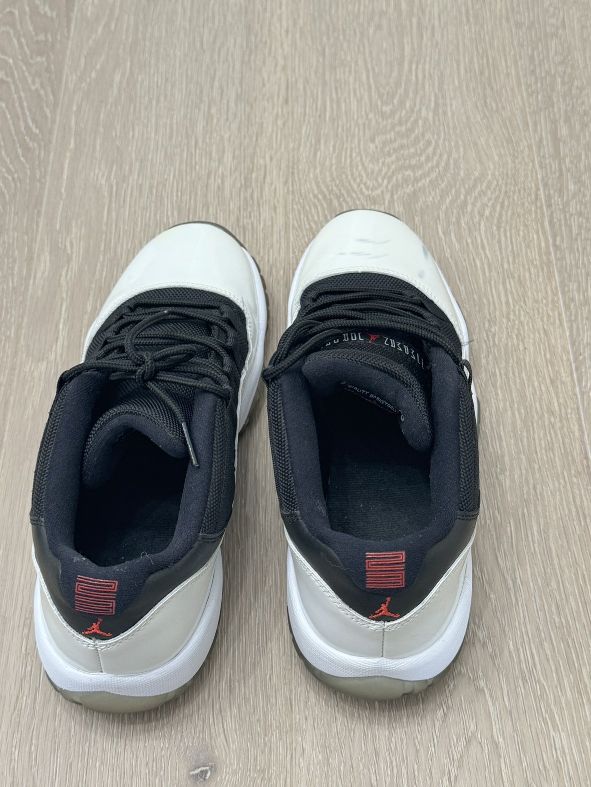 Jordan 11 low tuxedo