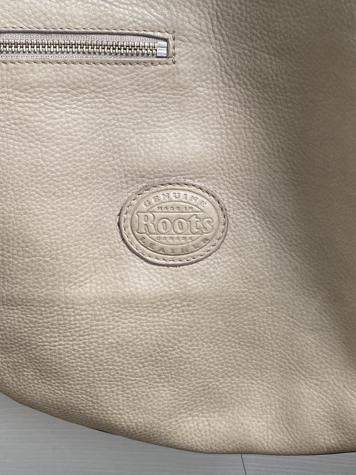 Roots cross body. image indicator(6)