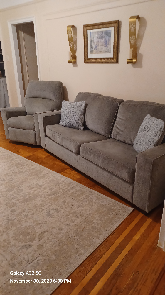 Ashley Sofa Queen sleeper with Rocker Recliner