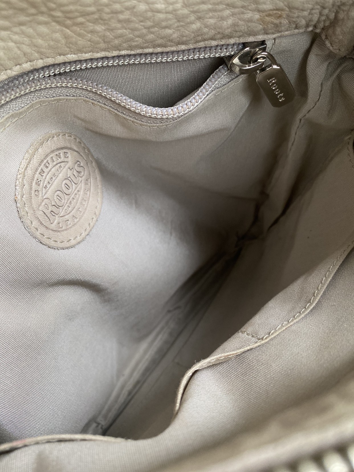 Roots cross body. image indicator(10)