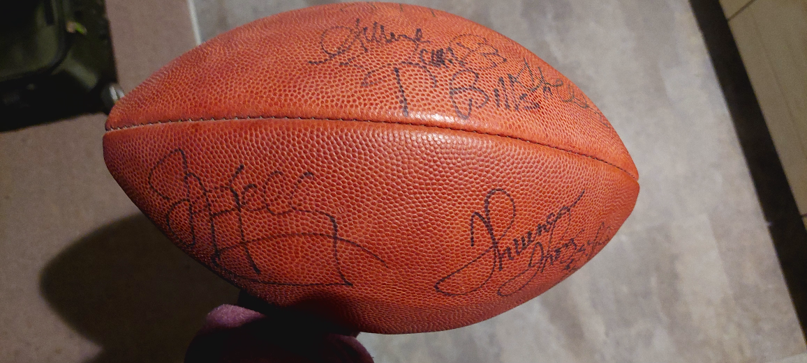 Jim Kelly  and others signed football