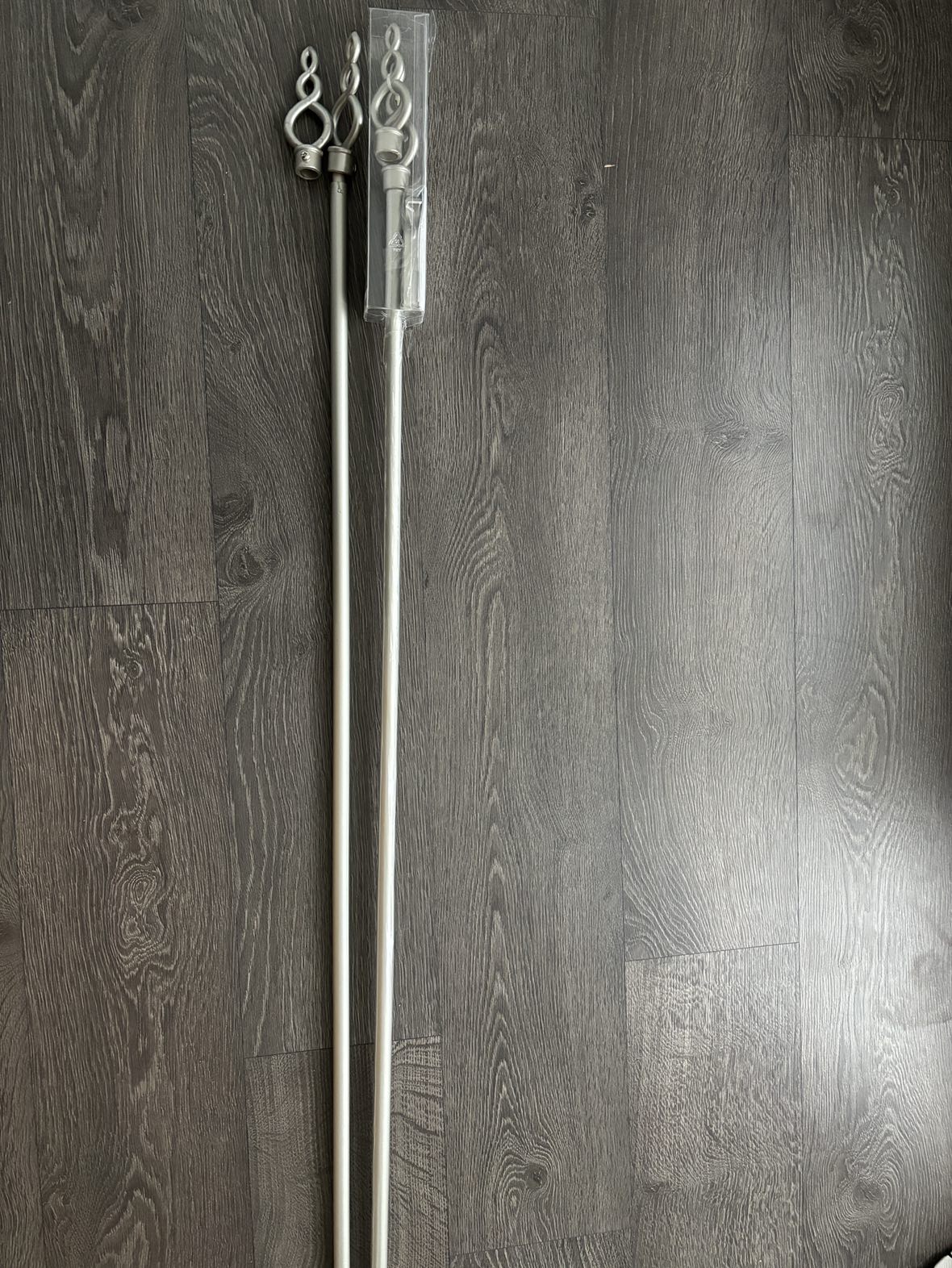 MOVING SALE ENDS TODAY ! 2 silver curtain rods (brand new)