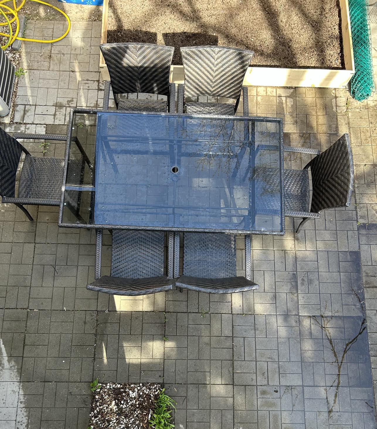 A Patio set table with glass top  with 6 chairs image indicator(6)