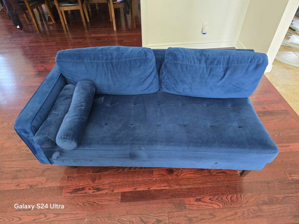 Blue 2 seater couch.