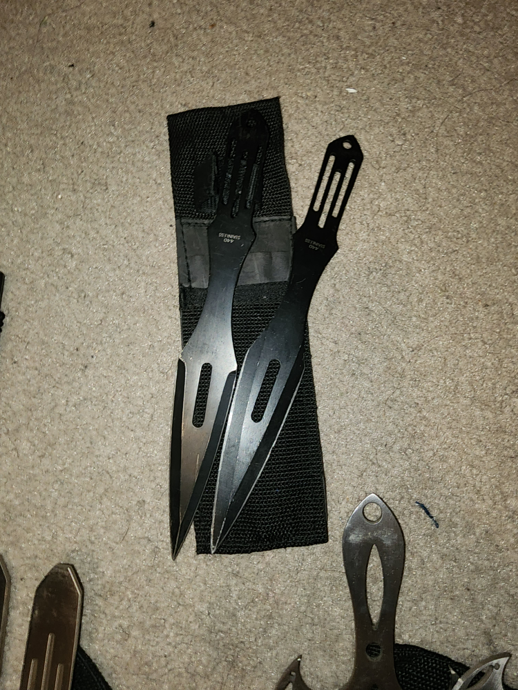 various throwing and display knives, swords, hatchets