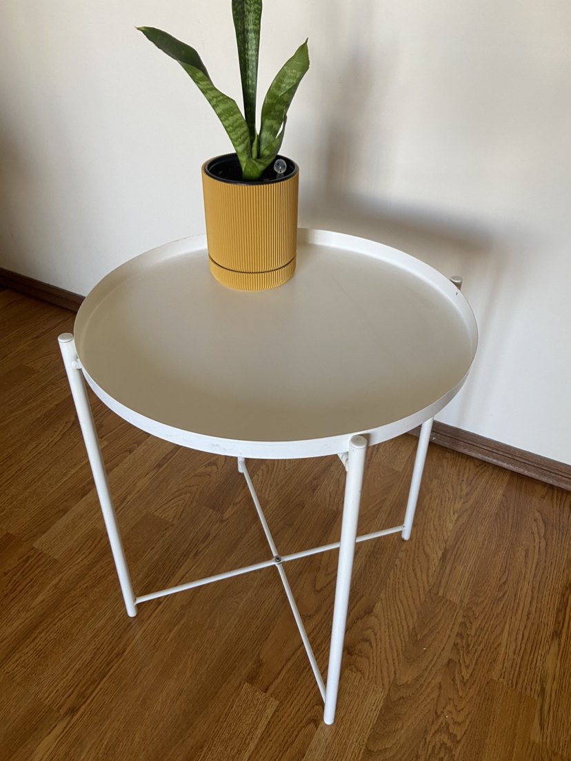 White metal outdoor table
