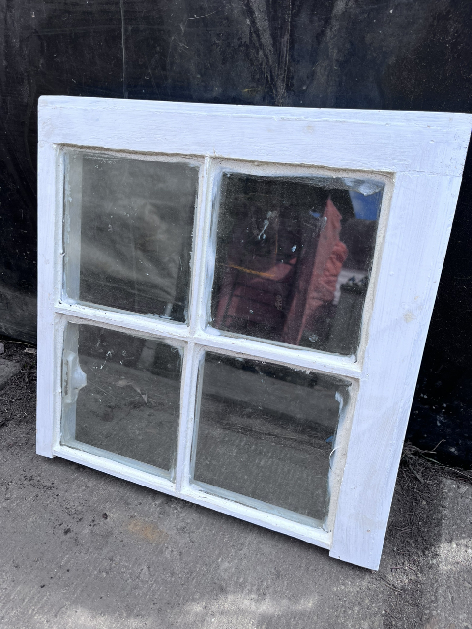 Old farm window with glass panes