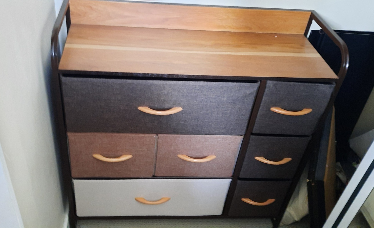 Dresser with canvas drawers wood handles.