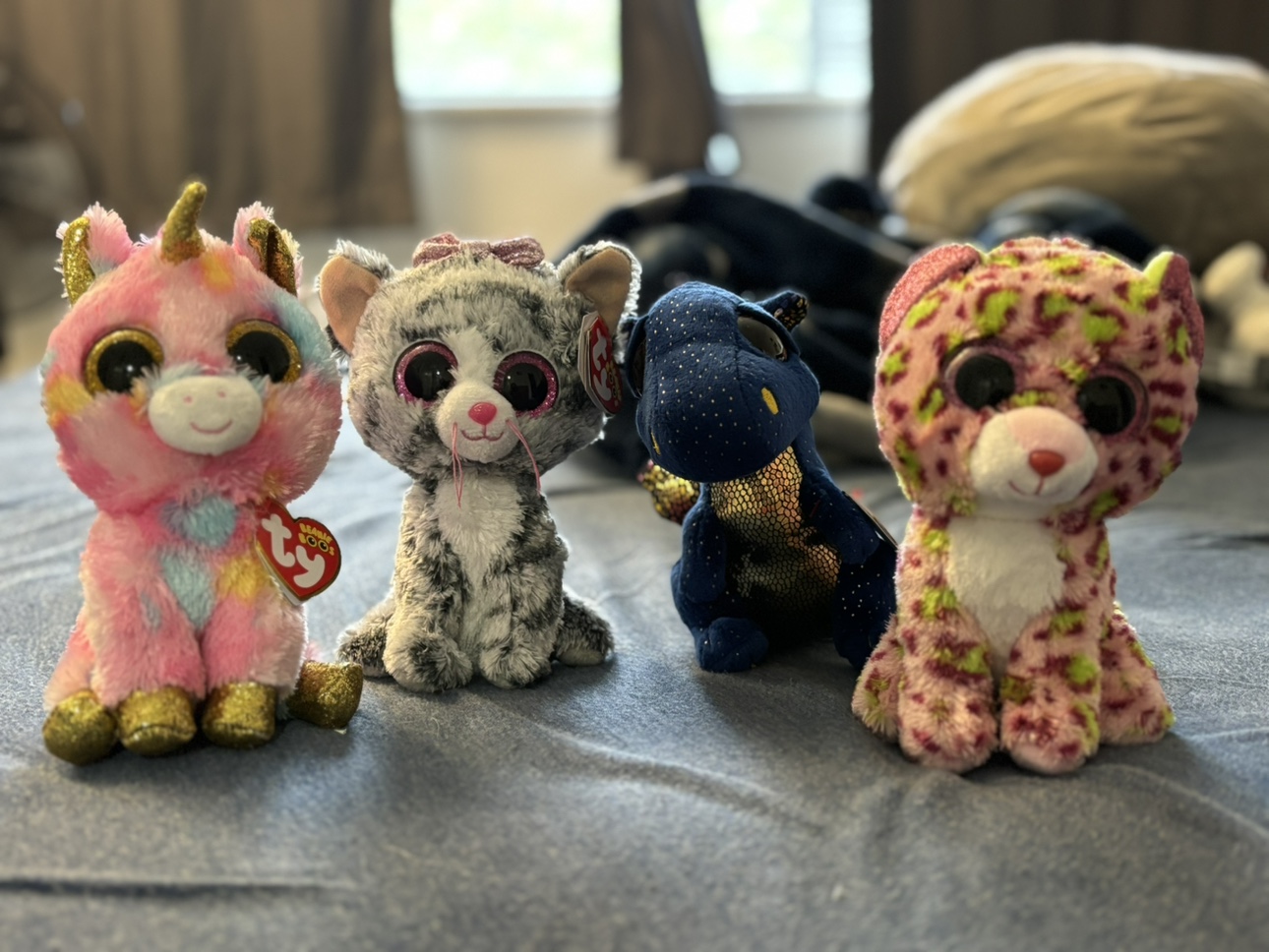 Stuffed toys and a valentine pillow