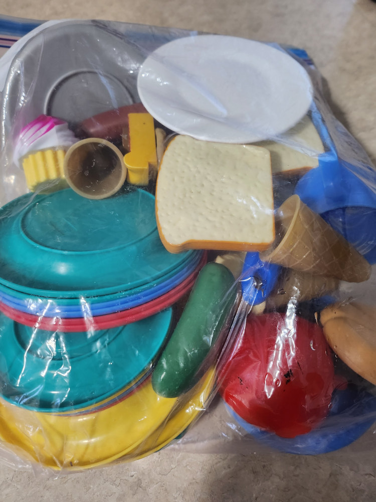 large ziploc bag with kitchen toys
