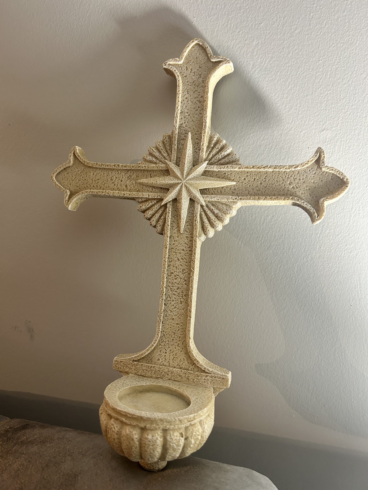 Stone cross with candle holder