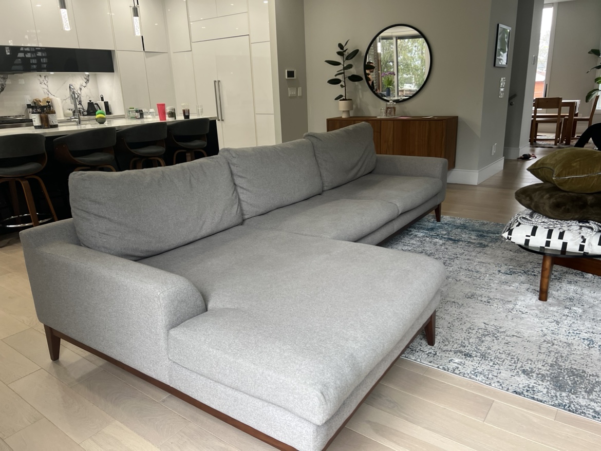 Grey, large sectional couch. Like new.