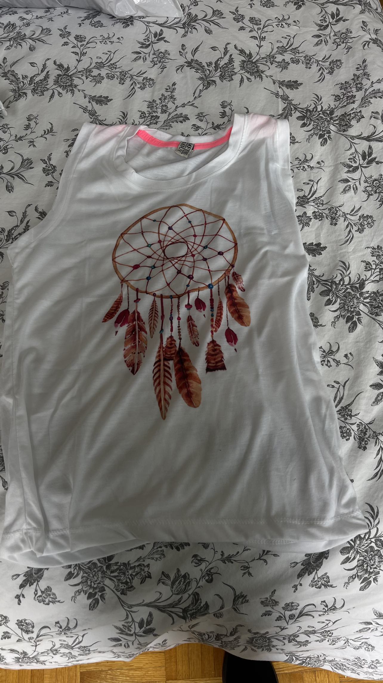 Sleeveless T-shirts - photo 2